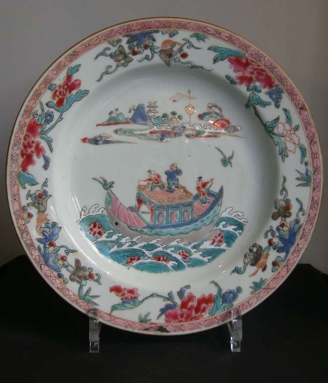 Plate decorated with enamels Famille Rose of three children on a boat